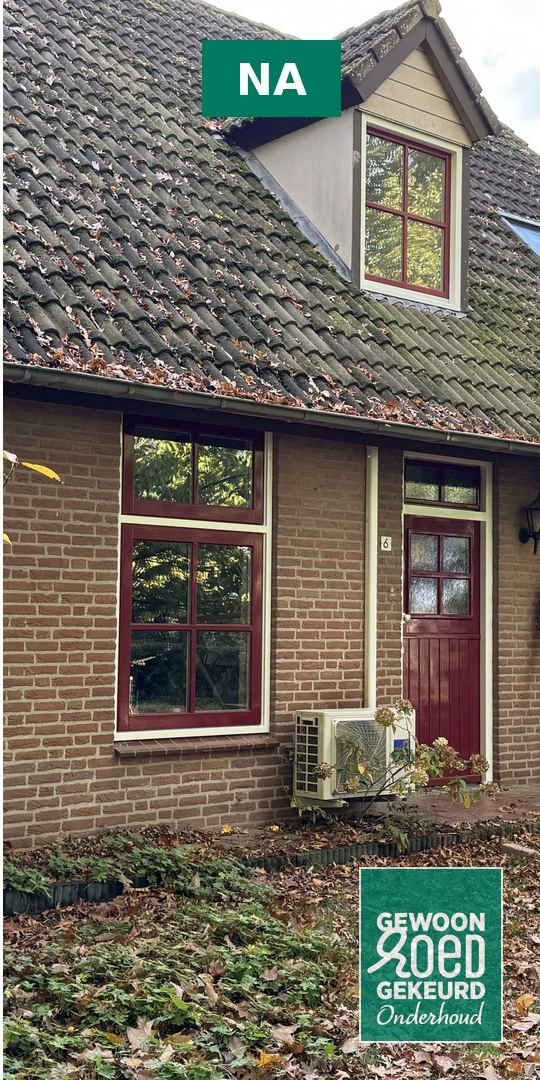 Woning met nieuwe bordeauxrode kozijnen